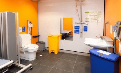 Changing Places toilet with orange walls